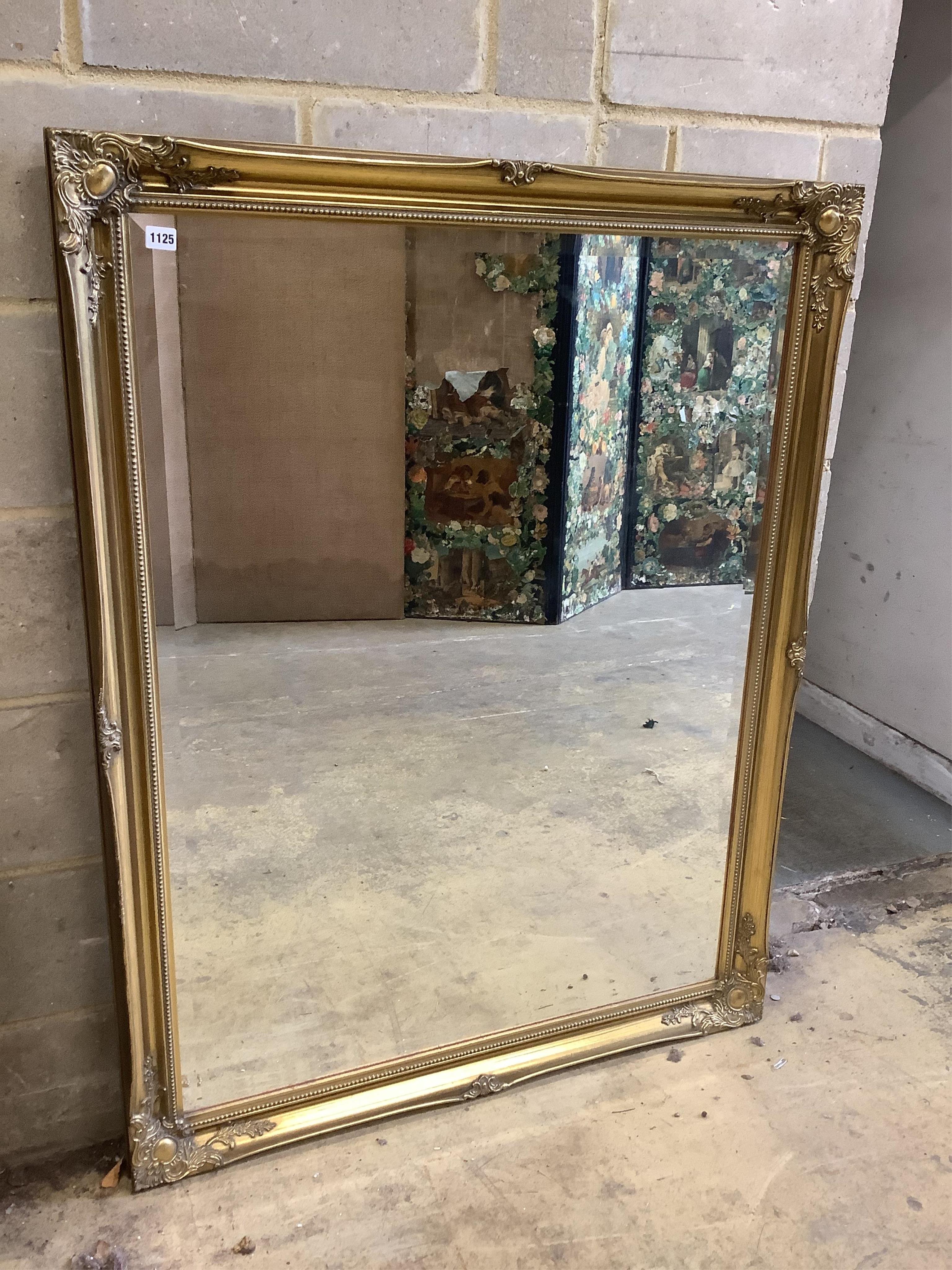 A Victorian style rectangular gilt framed wall mirror, width 103cm, height 131cm. Condition - good